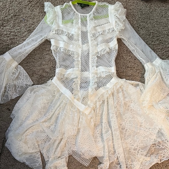 Dolls Kill Dresses & Skirts - Elegant White Lace Dress with Ruffle Details